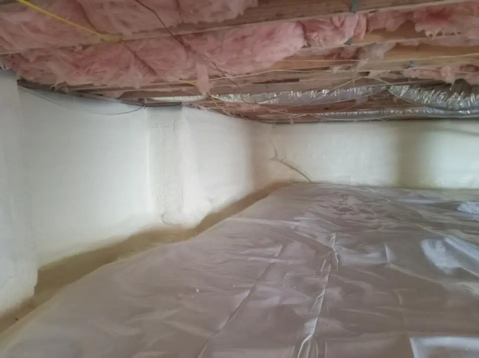Crawl space encapsulation with closed-cell spray foam for Commercial Roof Restoration in Orchard Mesa